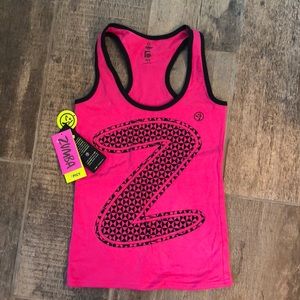 Zumba Spicy Top. New with tags. Size S.